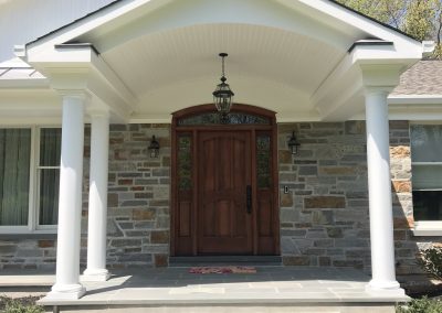 Front Portico with Stone Facade and Blue Stone Flooring